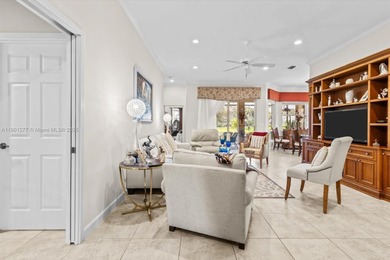 Welcome to this beautiful 2BR+Den, 2BA, 2CG single-family home on The Legacy Golf and Tennis Club in Florida - for sale on GolfHomes.com, golf home, golf lot