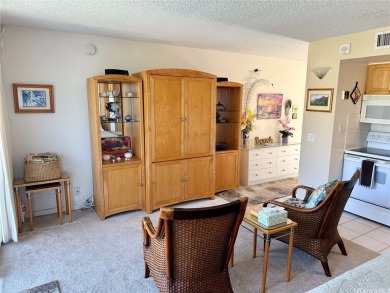 Situated in the highly sought-after and rarely available 1-stack on Makaha Valley Country Club in Hawaii - for sale on GolfHomes.com, golf home, golf lot