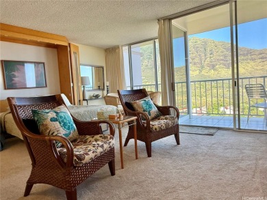 Situated in the highly sought-after and rarely available 1-stack on Makaha Valley Country Club in Hawaii - for sale on GolfHomes.com, golf home, golf lot