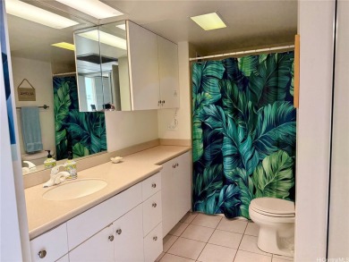 Situated in the highly sought-after and rarely available 1-stack on Makaha Valley Country Club in Hawaii - for sale on GolfHomes.com, golf home, golf lot
