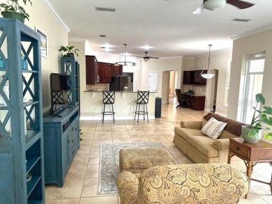 This home isn't the only thing beautiful about this property -- on Grand Haven Golf Club in Florida - for sale on GolfHomes.com, golf home, golf lot