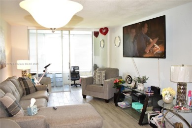 Nice, first floor 1 bedroom apartment with renovated kitchen on Sunrise Lakes Phase III in Florida - for sale on GolfHomes.com, golf home, golf lot