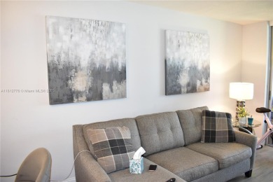 Nice, first floor 1 bedroom apartment with renovated kitchen on Sunrise Lakes Phase III in Florida - for sale on GolfHomes.com, golf home, golf lot