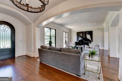 Experience unparalleled elegance in this luxury LAKEFRONT estate on The River Club in Georgia - for sale on GolfHomes.com, golf home, golf lot