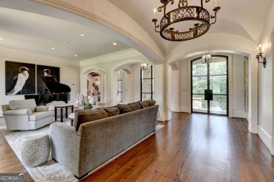 Experience unparalleled elegance in this luxury LAKEFRONT estate on The River Club in Georgia - for sale on GolfHomes.com, golf home, golf lot