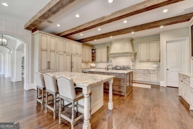 Experience unparalleled elegance in this luxury LAKEFRONT estate on The River Club in Georgia - for sale on GolfHomes.com, golf home, golf lot