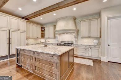 Experience unparalleled elegance in this luxury LAKEFRONT estate on The River Club in Georgia - for sale on GolfHomes.com, golf home, golf lot