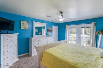 Welcome to your dream home on the water, where every detail has on Pass Christian Isles Golf Club in Mississippi - for sale on GolfHomes.com, golf home, golf lot
