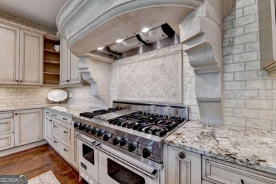 Experience unparalleled elegance in this luxury LAKEFRONT estate on The River Club in Georgia - for sale on GolfHomes.com, golf home, golf lot