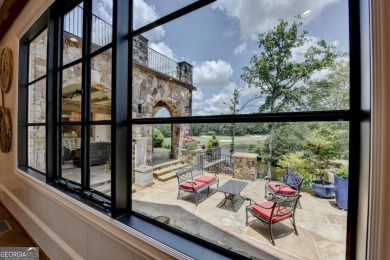 Experience unparalleled elegance in this luxury LAKEFRONT estate on The River Club in Georgia - for sale on GolfHomes.com, golf home, golf lot
