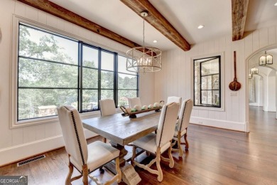 Experience unparalleled elegance in this luxury LAKEFRONT estate on The River Club in Georgia - for sale on GolfHomes.com, golf home, golf lot