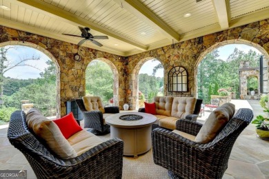 Experience unparalleled elegance in this luxury LAKEFRONT estate on The River Club in Georgia - for sale on GolfHomes.com, golf home, golf lot