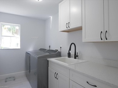 Thoughtfully remodeled (2022+) with modern finishes and an on Quail Village Golf Course in Florida - for sale on GolfHomes.com, golf home, golf lot