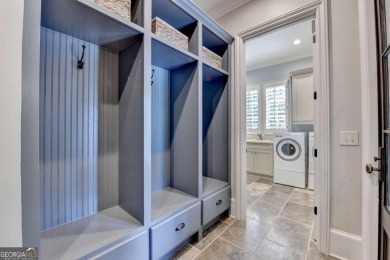 Experience unparalleled elegance in this luxury LAKEFRONT estate on The River Club in Georgia - for sale on GolfHomes.com, golf home, golf lot