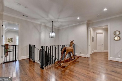 Experience unparalleled elegance in this luxury LAKEFRONT estate on The River Club in Georgia - for sale on GolfHomes.com, golf home, golf lot
