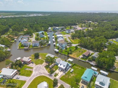 Welcome to your dream home on the water, where every detail has on Pass Christian Isles Golf Club in Mississippi - for sale on GolfHomes.com, golf home, golf lot