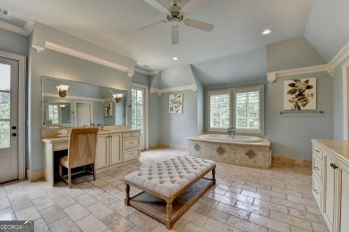 Experience unparalleled elegance in this luxury LAKEFRONT estate on The River Club in Georgia - for sale on GolfHomes.com, golf home, golf lot