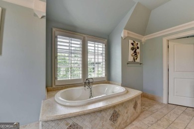 Experience unparalleled elegance in this luxury LAKEFRONT estate on The River Club in Georgia - for sale on GolfHomes.com, golf home, golf lot