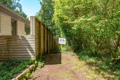 This classic all-limestone mid-century home featured in HGTV on Kalamazoo Country Club in Michigan - for sale on GolfHomes.com, golf home, golf lot