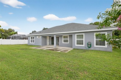 Experience the best of modern Florida living in this custom on Palm Harbor Golf Club in Florida - for sale on GolfHomes.com, golf home, golf lot