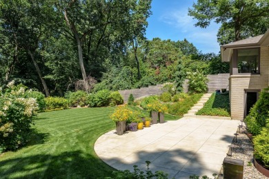 This classic all-limestone mid-century home featured in HGTV on Kalamazoo Country Club in Michigan - for sale on GolfHomes.com, golf home, golf lot