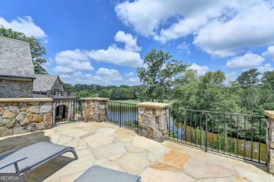 Experience unparalleled elegance in this luxury LAKEFRONT estate on The River Club in Georgia - for sale on GolfHomes.com, golf home, golf lot