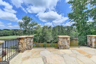 Experience unparalleled elegance in this luxury LAKEFRONT estate on The River Club in Georgia - for sale on GolfHomes.com, golf home, golf lot