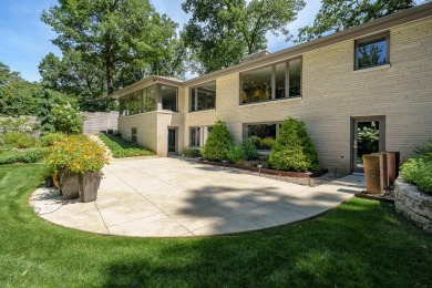 This classic all-limestone mid-century home featured in HGTV on Kalamazoo Country Club in Michigan - for sale on GolfHomes.com, golf home, golf lot