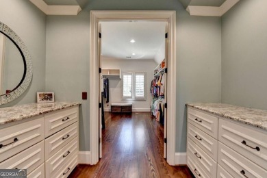 Experience unparalleled elegance in this luxury LAKEFRONT estate on The River Club in Georgia - for sale on GolfHomes.com, golf home, golf lot