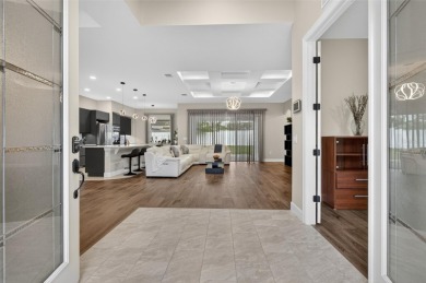 Experience the best of modern Florida living in this custom on Palm Harbor Golf Club in Florida - for sale on GolfHomes.com, golf home, golf lot