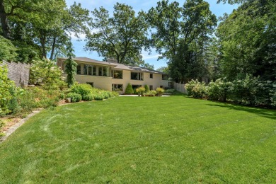 This classic all-limestone mid-century home featured in HGTV on Kalamazoo Country Club in Michigan - for sale on GolfHomes.com, golf home, golf lot