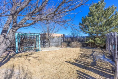 Charming Adobe Pumice Home with Expansive Mountain Views on Taos Country Club in New Mexico - for sale on GolfHomes.com, golf home, golf lot