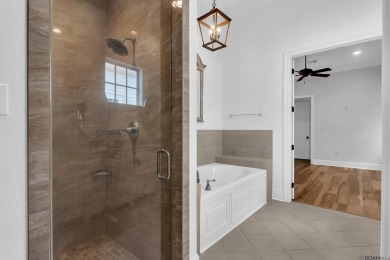 Discover a home that truly has it all! This stunning 3-bedroom on University Club in Louisiana - for sale on GolfHomes.com, golf home, golf lot