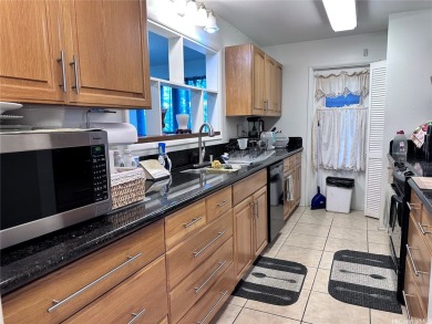 Rare Opportunity in Mililani Town - Spacious 5-Bedroom Home with on Mililani Golf Club in Hawaii - for sale on GolfHomes.com, golf home, golf lot
