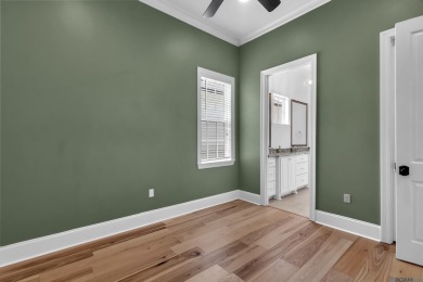 Discover a home that truly has it all! This stunning 3-bedroom on University Club in Louisiana - for sale on GolfHomes.com, golf home, golf lot