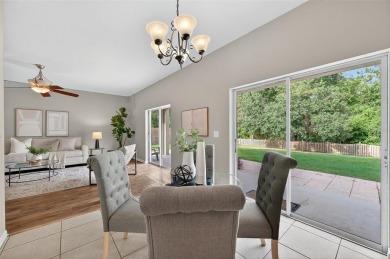 SCENIC. SPACIOUS. SERENEe visit this 4-bedroom, 2.5-bath home on on Meadow Oaks Golf and Country Club in Florida - for sale on GolfHomes.com, golf home, golf lot