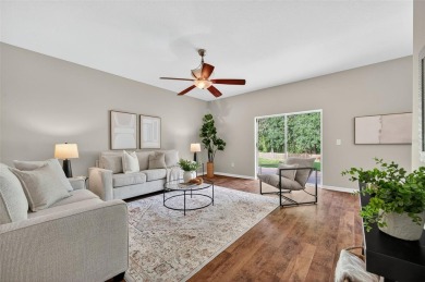SCENIC. SPACIOUS. SERENEe visit this 4-bedroom, 2.5-bath home on on Meadow Oaks Golf and Country Club in Florida - for sale on GolfHomes.com, golf home, golf lot