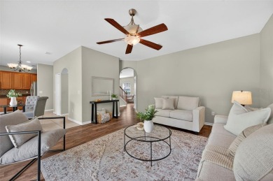 SCENIC. SPACIOUS. SERENEe visit this 4-bedroom, 2.5-bath home on on Meadow Oaks Golf and Country Club in Florida - for sale on GolfHomes.com, golf home, golf lot