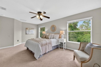 SCENIC. SPACIOUS. SERENEe visit this 4-bedroom, 2.5-bath home on on Meadow Oaks Golf and Country Club in Florida - for sale on GolfHomes.com, golf home, golf lot