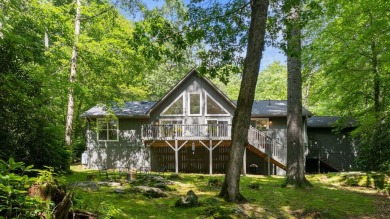 Located in the heart of Sapphire Valley, this well-maintained on Sapphire National Golf Club in North Carolina - for sale on GolfHomes.com, golf home, golf lot