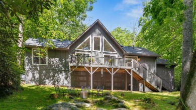 Located in the heart of Sapphire Valley, this well-maintained on Sapphire National Golf Club in North Carolina - for sale on GolfHomes.com, golf home, golf lot