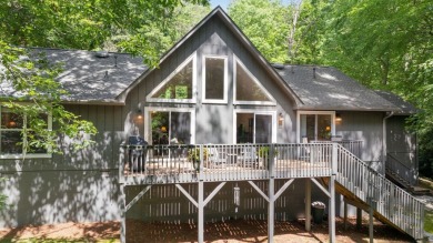 Located in the heart of Sapphire Valley, this well-maintained on Sapphire National Golf Club in North Carolina - for sale on GolfHomes.com, golf home, golf lot