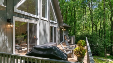 Located in the heart of Sapphire Valley, this well-maintained on Sapphire National Golf Club in North Carolina - for sale on GolfHomes.com, golf home, golf lot