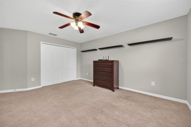 SCENIC. SPACIOUS. SERENEe visit this 4-bedroom, 2.5-bath home on on Meadow Oaks Golf and Country Club in Florida - for sale on GolfHomes.com, golf home, golf lot
