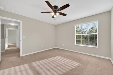 SCENIC. SPACIOUS. SERENEe visit this 4-bedroom, 2.5-bath home on on Meadow Oaks Golf and Country Club in Florida - for sale on GolfHomes.com, golf home, golf lot