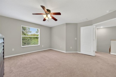 SCENIC. SPACIOUS. SERENEe visit this 4-bedroom, 2.5-bath home on on Meadow Oaks Golf and Country Club in Florida - for sale on GolfHomes.com, golf home, golf lot