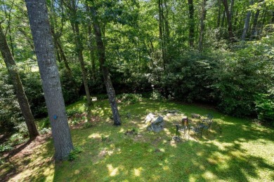 Located in the heart of Sapphire Valley, this well-maintained on Sapphire National Golf Club in North Carolina - for sale on GolfHomes.com, golf home, golf lot