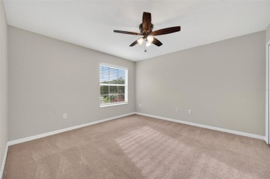 SCENIC. SPACIOUS. SERENEe visit this 4-bedroom, 2.5-bath home on on Meadow Oaks Golf and Country Club in Florida - for sale on GolfHomes.com, golf home, golf lot