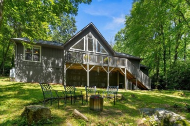 Located in the heart of Sapphire Valley, this well-maintained on Sapphire National Golf Club in North Carolina - for sale on GolfHomes.com, golf home, golf lot