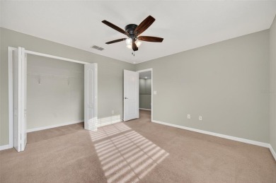 SCENIC. SPACIOUS. SERENEe visit this 4-bedroom, 2.5-bath home on on Meadow Oaks Golf and Country Club in Florida - for sale on GolfHomes.com, golf home, golf lot